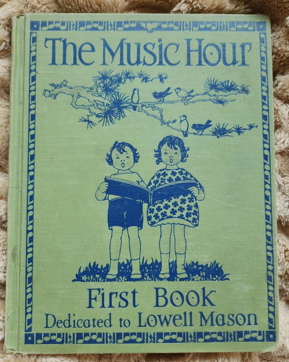 A vintage copy of "The Music Hour: First Book," 1937
